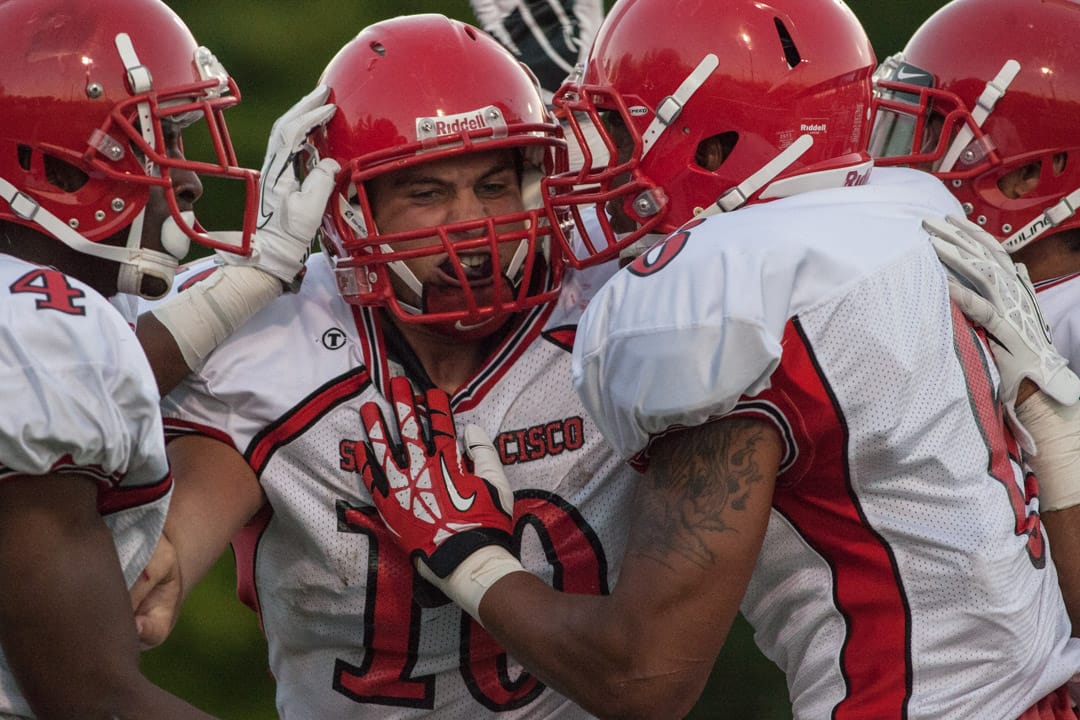 Rams football team wins opener