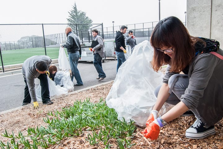 Crews lend a hand to help clean the school grounds