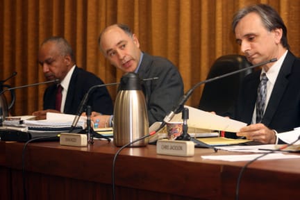 Chancellor Don Q. Griffin, Trustee Milton Marks III, and Trustee John Rizzo discuss resolutions that were removed from the agenda at their monthly meeting Jan. 28. JESSICA LUTHI / THE GUARDSMAN