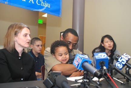 The Washington family listens as SFUSD Board of Education President Jane Kim (right) advocates for the Board of Supervisors sanctuary policy amendment at a March 1 press conference. Tracey Washington (left) and her two sons faced deportation after the 13-year-old boy (back) stole 46 cents. ICE granted them a 60-day extension on March 3. RAMSEY EL-QARE / THE GUARDSMAN