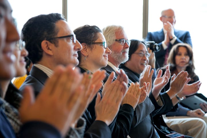 Attendees applaud House Minority Leader Nancy Pelosi during a press conference,Jan. 6, 2014, on Chinatown/North Beach center. Photo by Santiago Mejia/The Guardsman