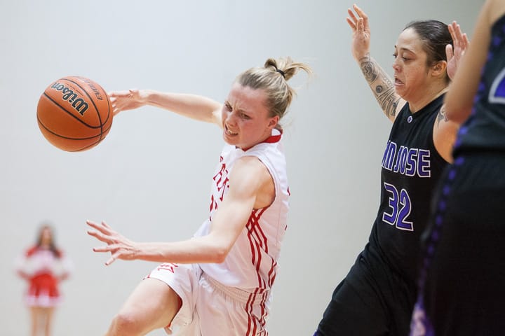 Rams’ sophomore guard Tatsiana Dashkevich (12) drives the ball to the hoop against the San Jose Jaguars in the first half of a CCCAA women’s basketball game, Jan. 17, 2014, on Ocean campus. Photo by Santiago Mejia/The Guardsman