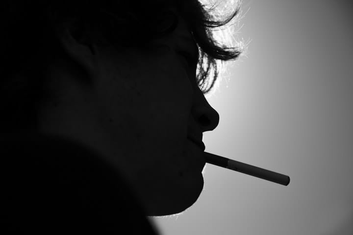 A silhouette of an e-cig smoker, Wednesday, Feb. 19, 2014, at Ocean campus. Photo by Elisa Parrino/The Guardsman