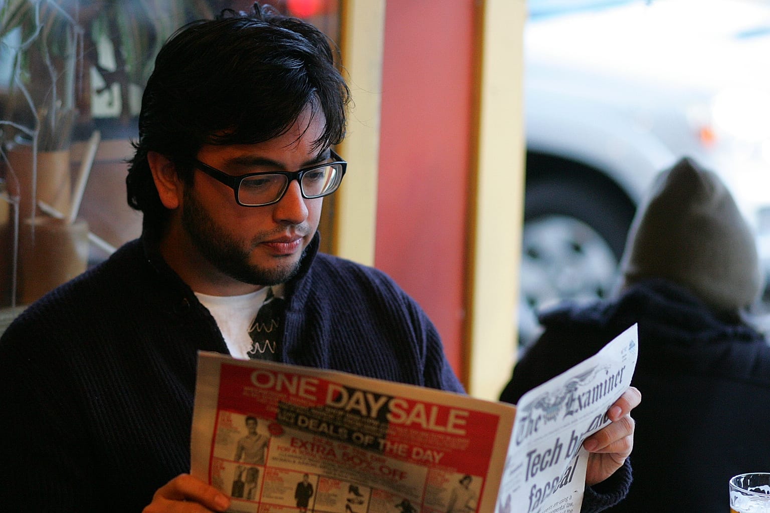 After a day’s work at the Bay Guardian, staff writer Joe Fitzgerald, 27, relaxes at the Blue Danube Coffee House on Monday, March 10, 2014. Photo by Jackson Ly/The Guardsman