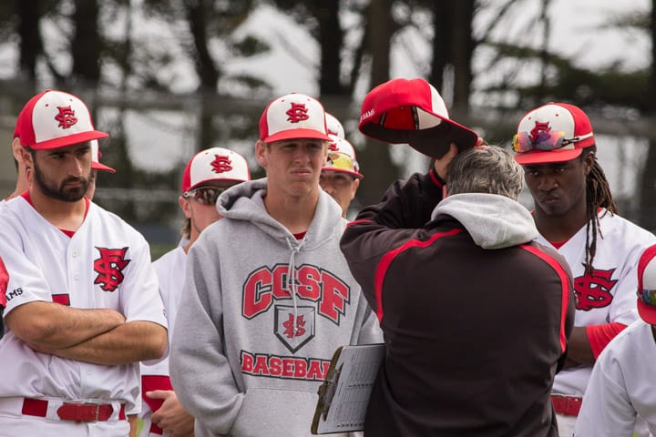 Head coach John Vanoncini speaks to the Rams after their loss against De Anza College, Friday, April 18, 2014, at Fairmont Field in Pacifica. Photo by Khaled Sayed/The Guardsman