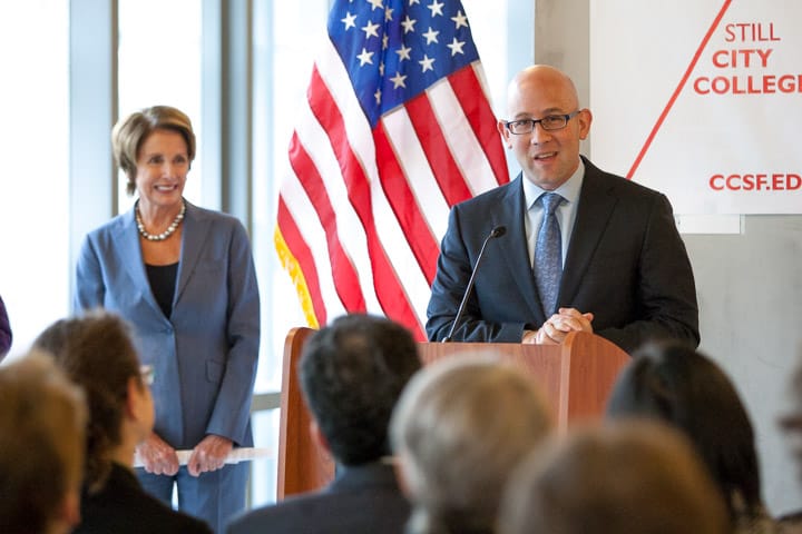 FILE PHOTO - In this Jan. 6, 2014, file photo - Rafael Mandelman, City College of San Francisco board of trustee member, right, speaks about the school's accreditation crisis during a news conference at the Chinatown campus. Photo by Santiago Mejia/The Guardsman