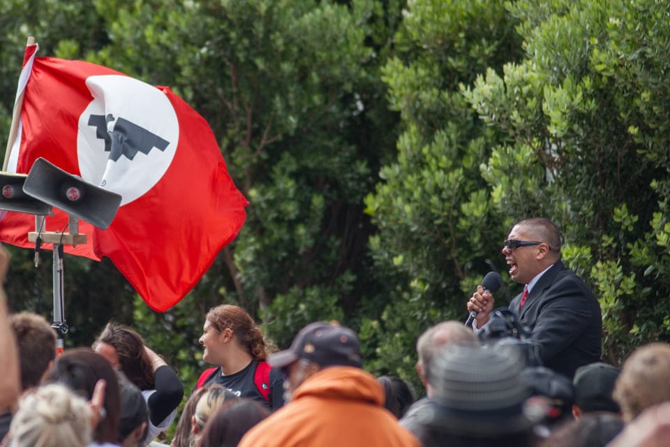 Ben Bac Sierra speaks to attendees of the rally in front of The Phillip Burton Federal Building & United States Courthouse at 450 Golden Gate Avenue in San Francisco where the family of Alex Nieto will file papers asking for a civil lawsuit on Aug. 22, 2014. (Photo by Nathaniel Y. Downes)