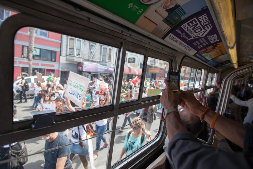 Friends, family and community members march from the Alex Nieto Memorial at Bernal Heights Park to  The Phillip Burton Federal Building & United States Courthouse at 450 Golden Gate Avenue in San Francisco to honor Alex Nieto on the 5-month anniversary of his death on Aug. 22, 2014. (Photo by Nathaniel Y. Downes)