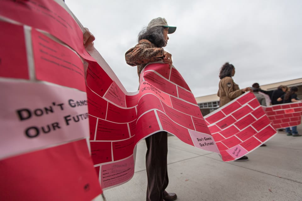 Students, faculty and supporters delivery 3,000 messages to Susan Lamb, Vice Chancellor of Academic Affairs, appealing class closures due to low enrollment at City College on Monday, Aug. 22, 2014.  88 classes were cancelled affecting 370 students. (Photo by Nathaniel Y. Downes)