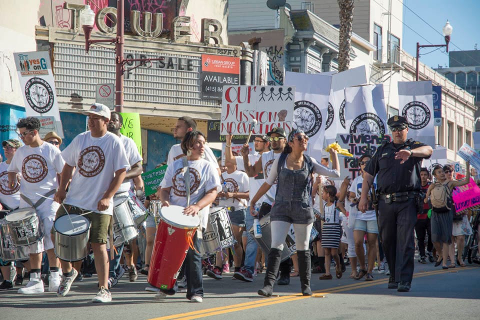Demonstrators, in support of Prop. G, march to 16th and Mission Streets, Saturday, Oct. 4, 2014 ( Photo by Niko Plagakis)