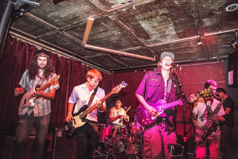 Sweet Plot played third, with former City College student and lead singer Cole Kromer ( right from center).  (Photo by Elisa Parrino) 