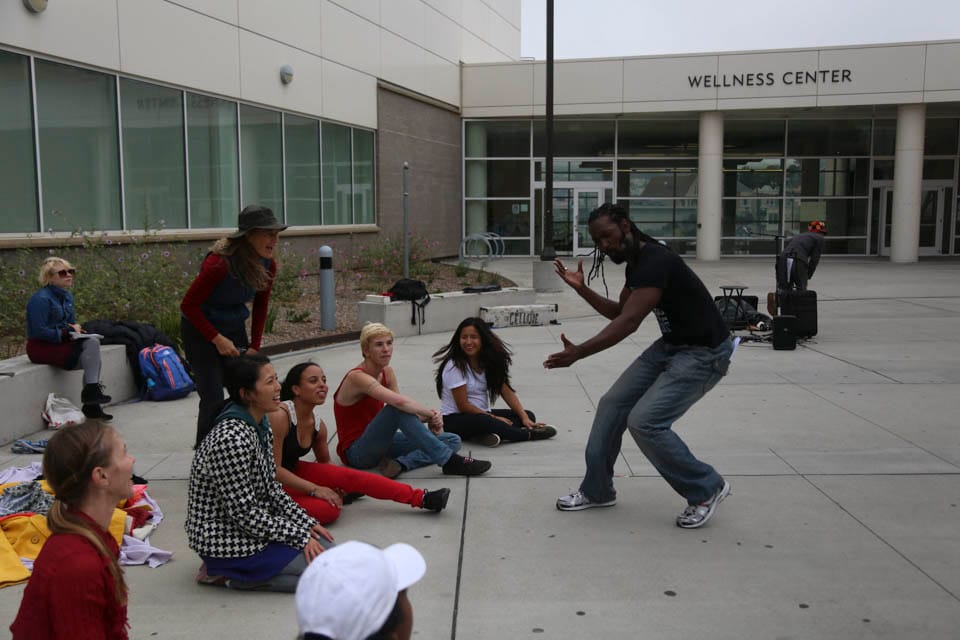 Dancer Antoine Hunter, right, practices strong body language in front of the Trolley Dancers cast, Friday, Oct. 10, at Ocean Campus. (Photo by Natasha Dangond)