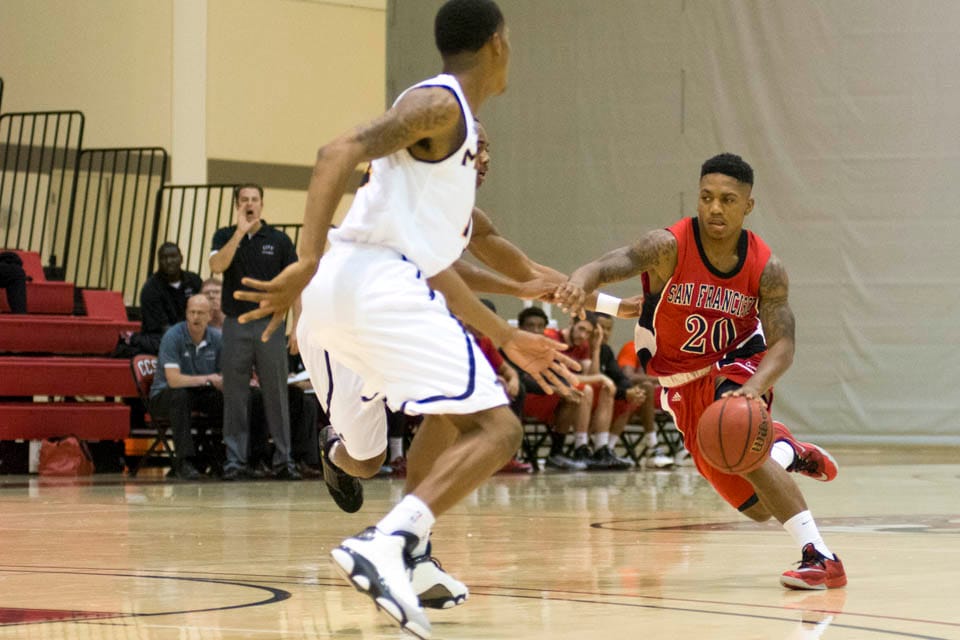 Vincent Golson #20, strikes hard to beat a College of Marin defender at City College's preseason tournament on Nov.7. (Photo by Niko Plagakis)