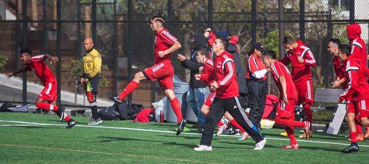 Rams bench clears following their playoff win. (Santiago Mejia)