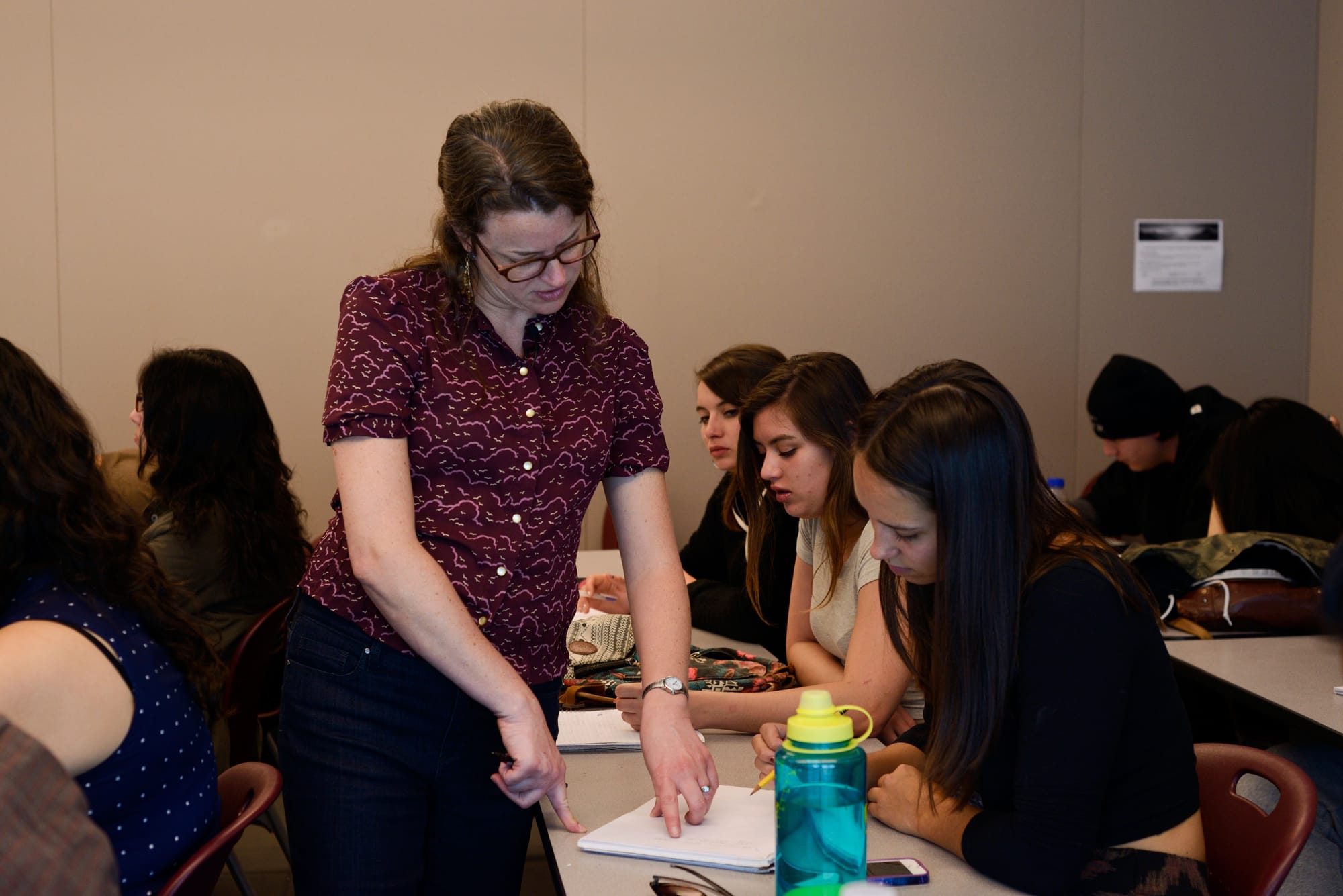 Professor Keys does a walk through her classroom, aiding students to solve and understand functions on March 25 on the Multi Use Building.