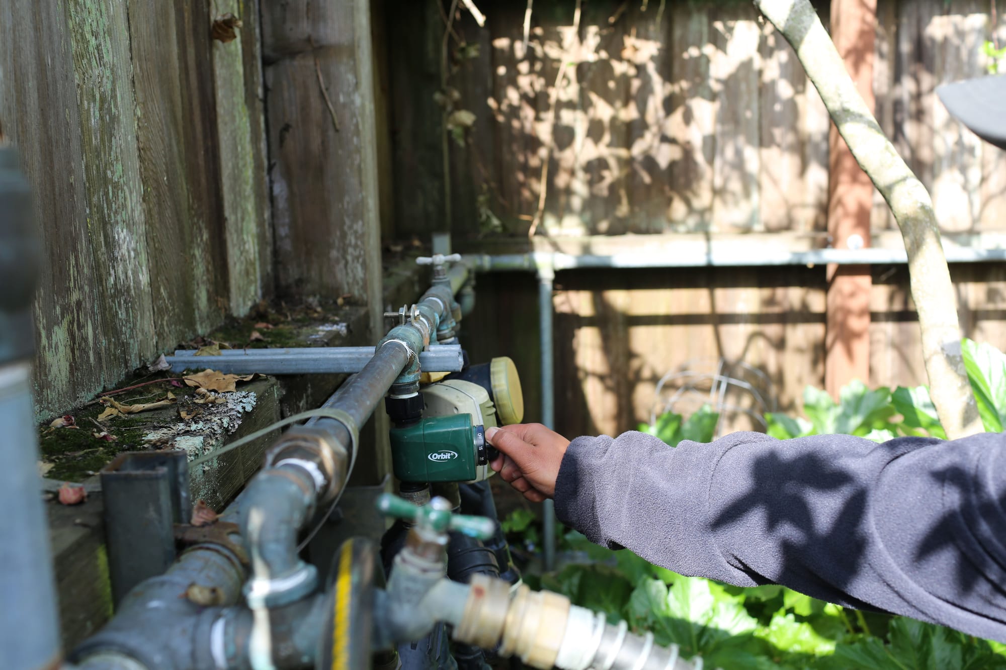 Demonstration on the use of water breakers in the greenhouses at the Ocean Campus. (Photo by Natasha Dangond)