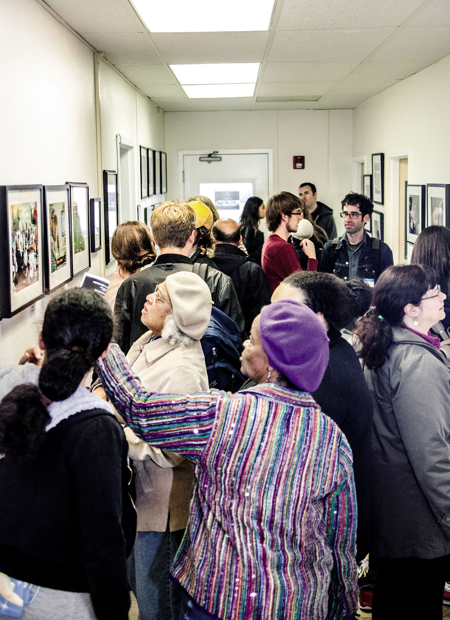 More than 100 people attended the Front Page Gallery's opening reception of “Life on the Hill: City College and All Its Glory,” photo exhibition by The Guardsman photographers on Thursday, April 23. (Photo by Ekevara Kitpowsong)