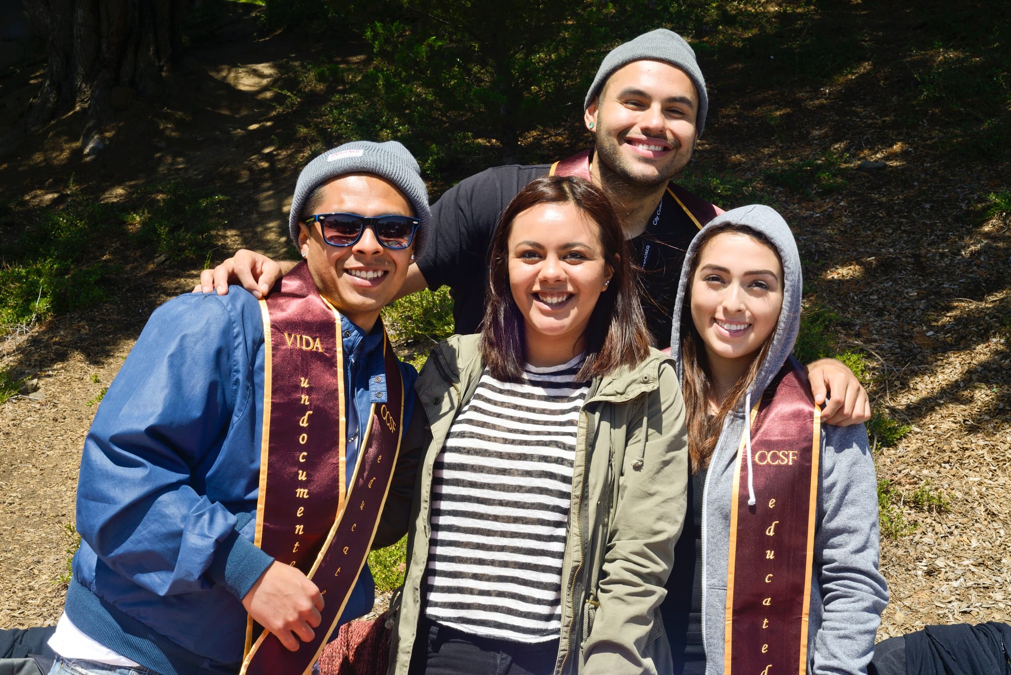 (From left to right) Christian Arevalo, Martha Garcia, Edgar Lara and Alma Ramos pose for a picture on their VIDA table on Frisco Day at City College on Friday April 24, 2015.