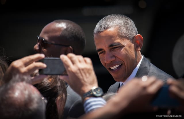 President Barack Obama waves to well-wishers at San Francisco International Airport on Friday, June 19, 2015.