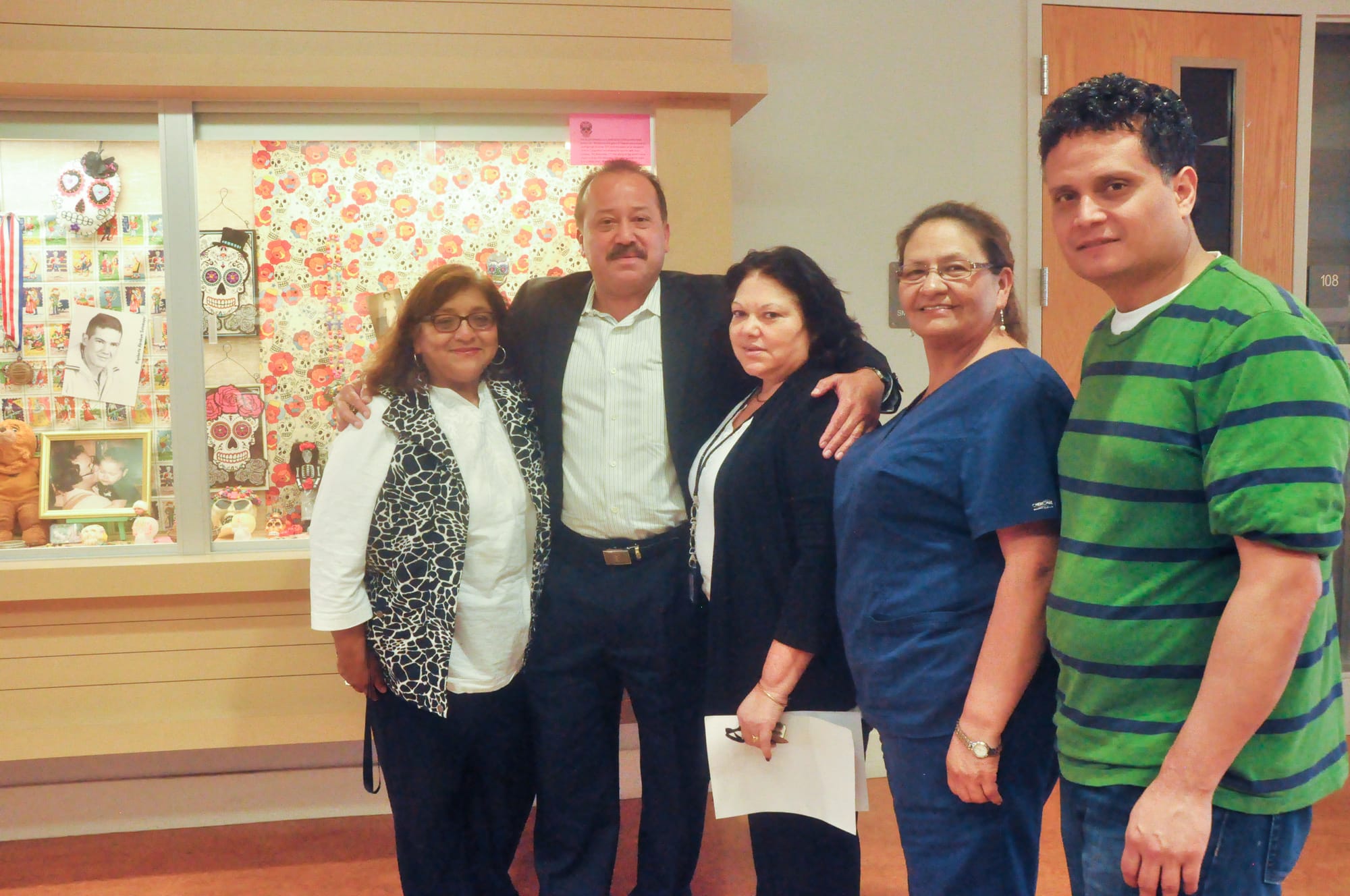 (L-R) Silvia Urrutia, Dean Jorge Bell, Silvia Elizabeth Noyola, Teresa Villicana and Salvador Ortiz-Solovie contributed to making a total of eight altars displayed at City College Mission Campus on Thursday, Oct. 29 2015. (Photo by Bridgid Skiba/The Guardsman)