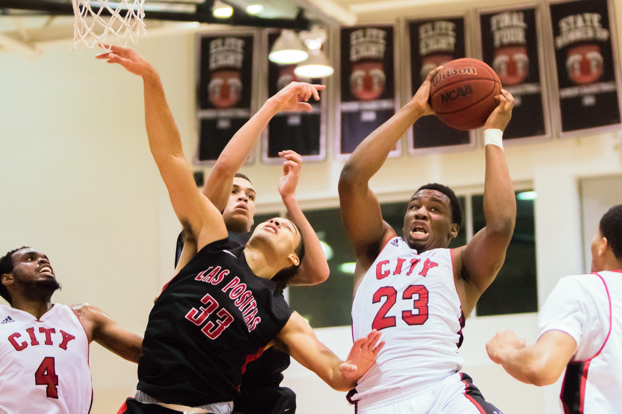 City College sophomore forward Jalen Canty (23) grabs the rebound against Las Positas College on January 22, 2016. (Photo by Peter Wong/Special to The Guardsman)