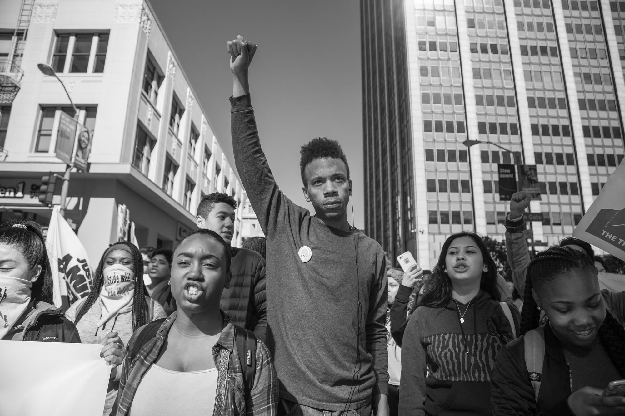 City College student Adam Coleman demands justice for Alex Nieto outside the Phillip Burton Federal building on Tues. March 1, 2016. (Photo by Gabriella Angotti-Jones / The Guardsman)