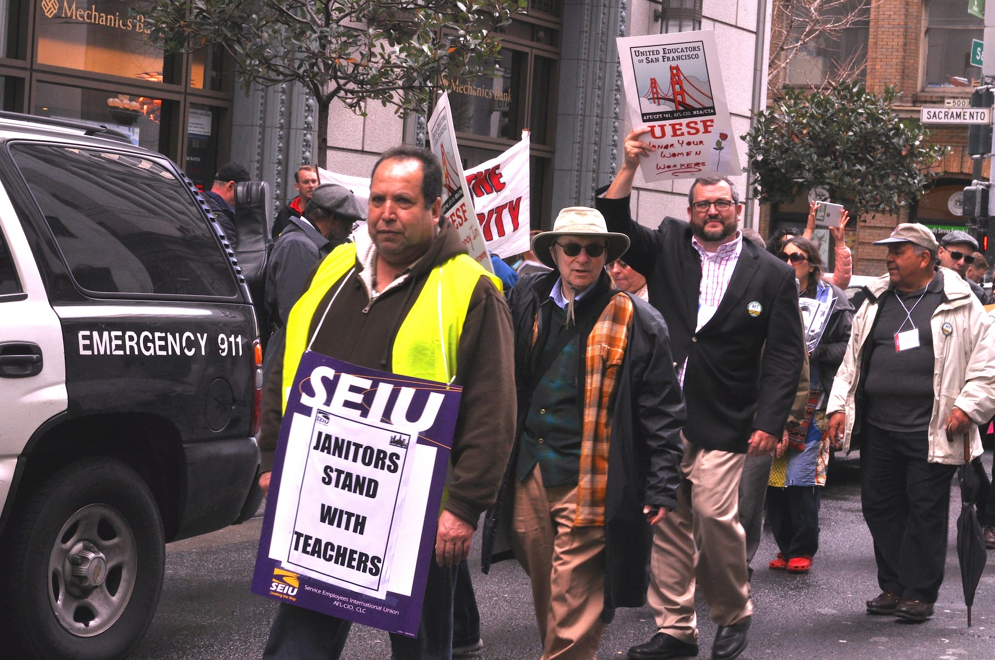 City College janitors unite in solidarity with supporters for a fair contract during the rally and march in front of the office of Jeff Sloan, City College’s lead negotiator on March 11, 2016. (Photo by Bridgid Skiba/contributor to The Guardsman)