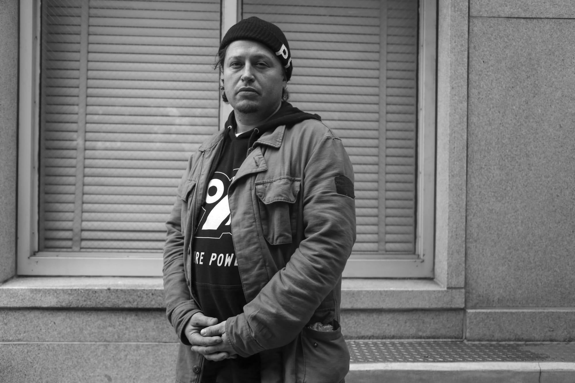 Gabe Kahn, a protester at the rally inside City Hall on the night of Friday, May 6, stands in front of the SF County Jail after being released. (Photo taken by Natasha Dangond/ Special to the Guardsman