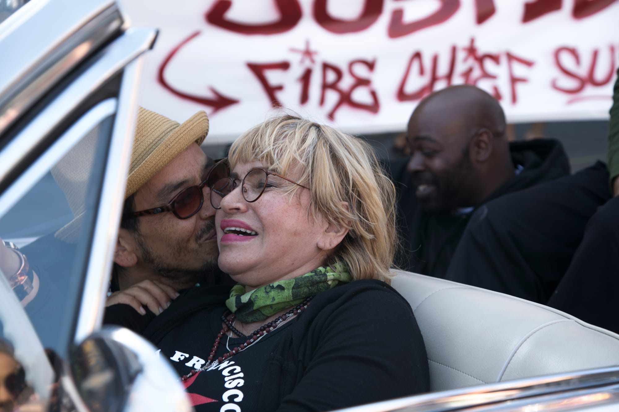 Maria Cristina Gutierrez, 66, is kissed by son and fellow hunger striker Ilyich Sato, 42, outside the Mission Police Station on May 1, 2016. (Photo by Gabriella Angotti-Jones/The Guardsman)