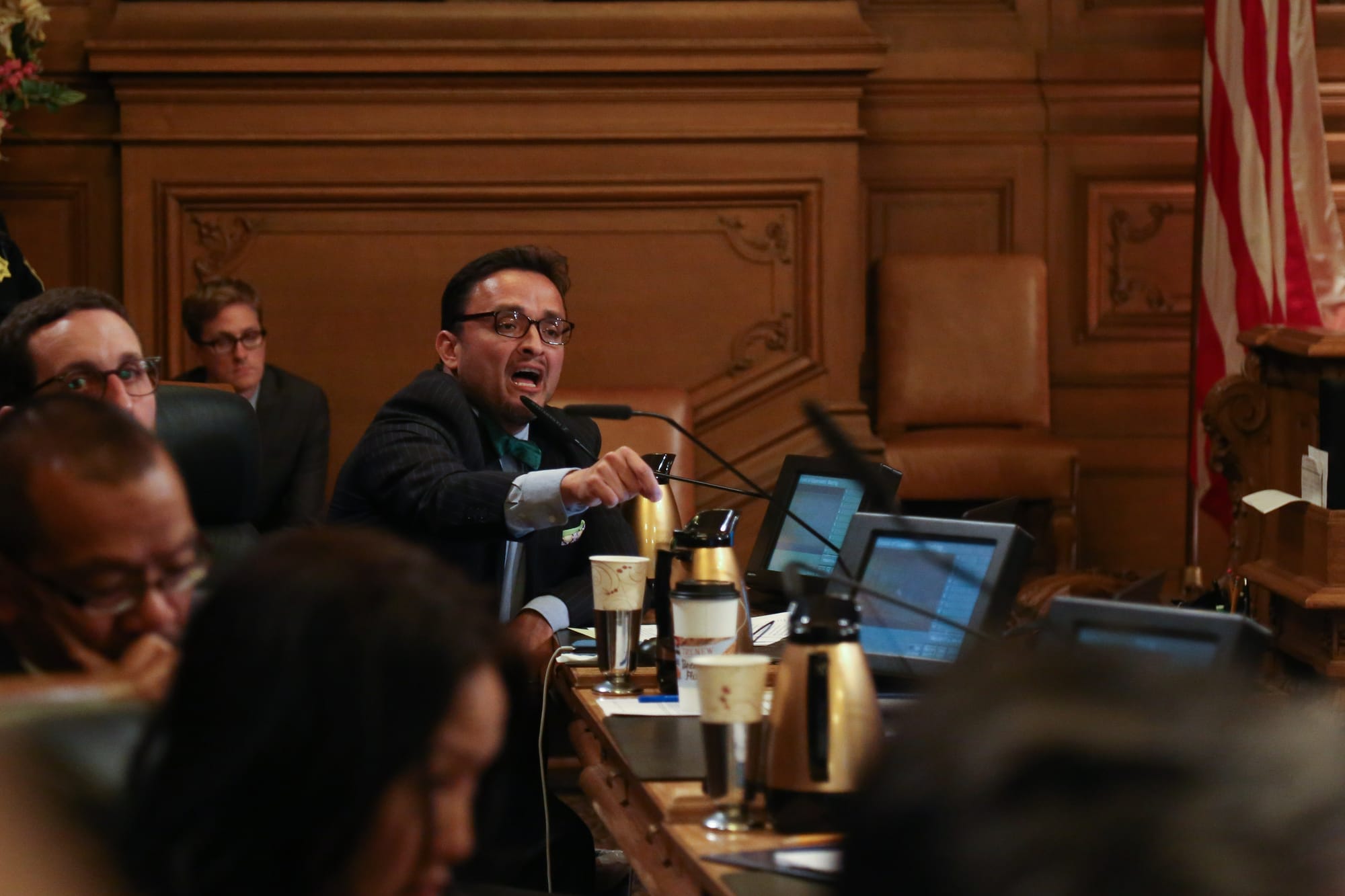 Board of Supervisors member Dave Campos responding to Frisco Five members after they initiated a meeting inside City Hall on Tues. May 3, 2016, (Photo by Natasha Dangond/Special to The Guardsman)