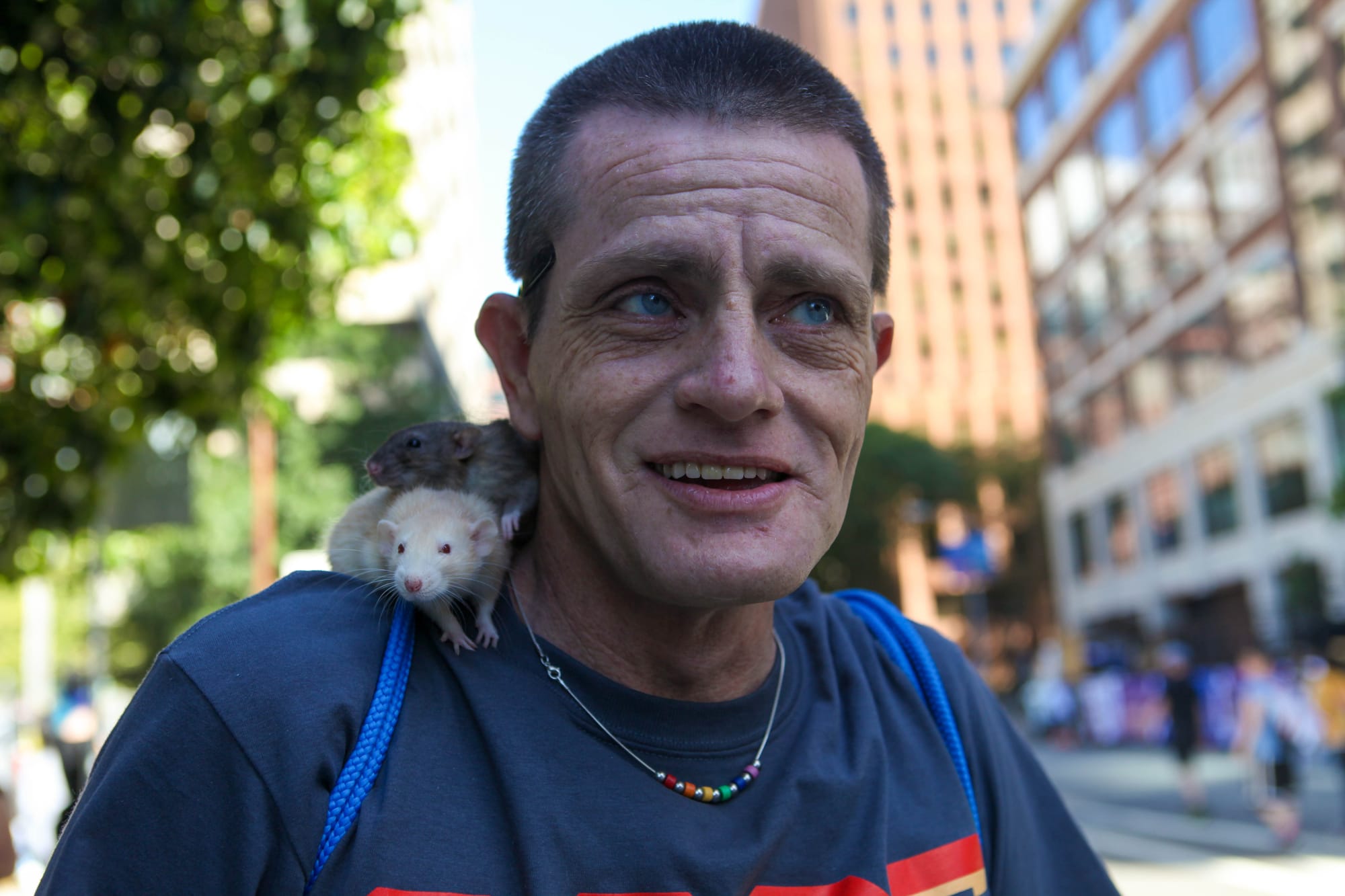 City College student John Gallo and pet rats march with the City College contingent in the San Francisco Pride Parade on June 26, 2016. (Photo by Cassie Ordonio/The Guardsman)