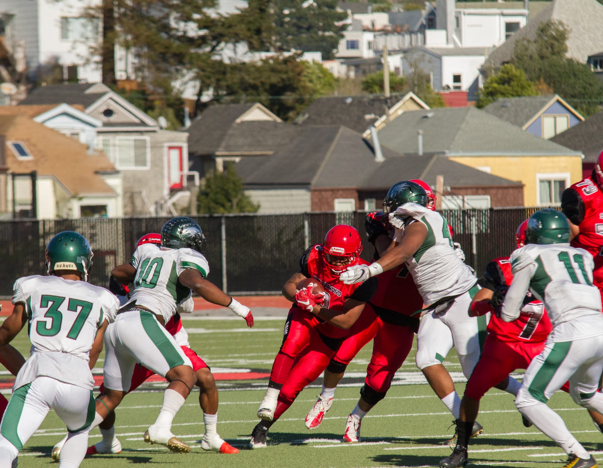 Rams running back Lorenzo Logwood (3) breaks through a tackle during the San Francisco Community College Bowl at George Rush Staduim on Saturday Deember 3, 2016. Photo by Franchon Smith/The Guardsman