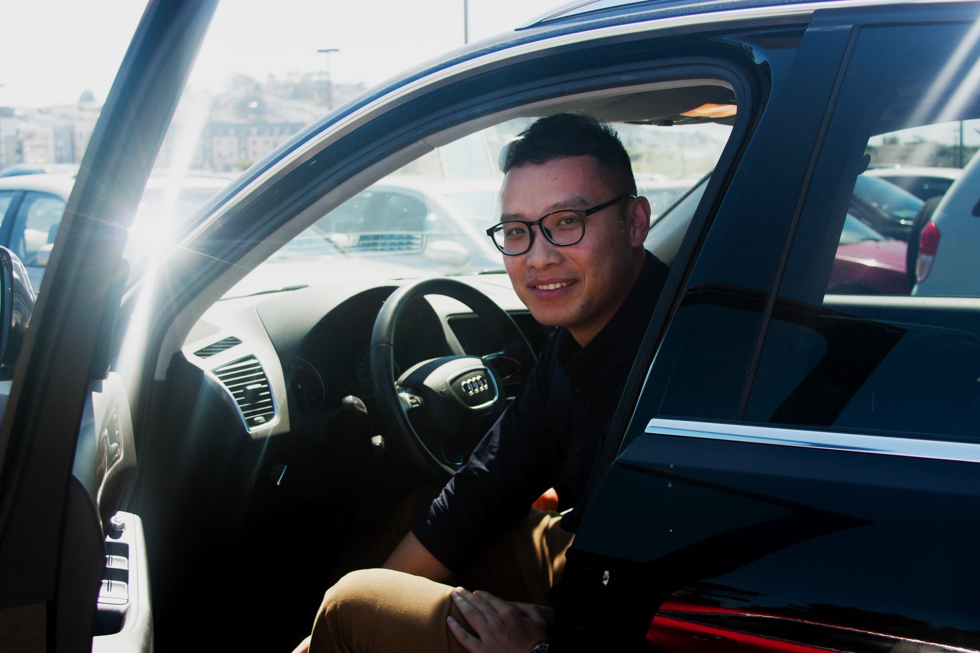 “I don’t usually park down there, in the morning I park in the back behind the bungalow so it would not affect my normal school days.” Photo caption: River (freshman) leans out of his audi as he gets ready to depart to class.