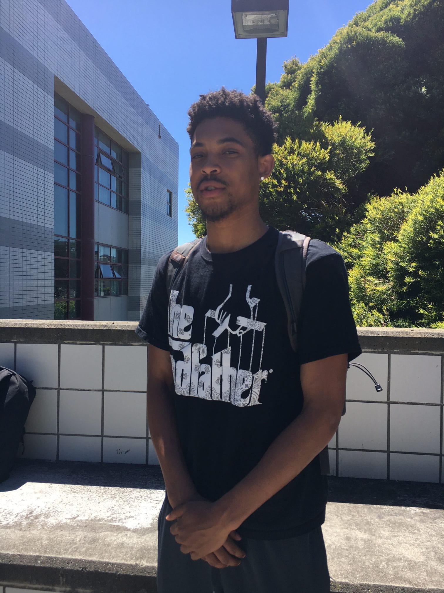 Copeland gives his gives his typical smoldering look as he basks in the sunshine outside the CCSF library.  