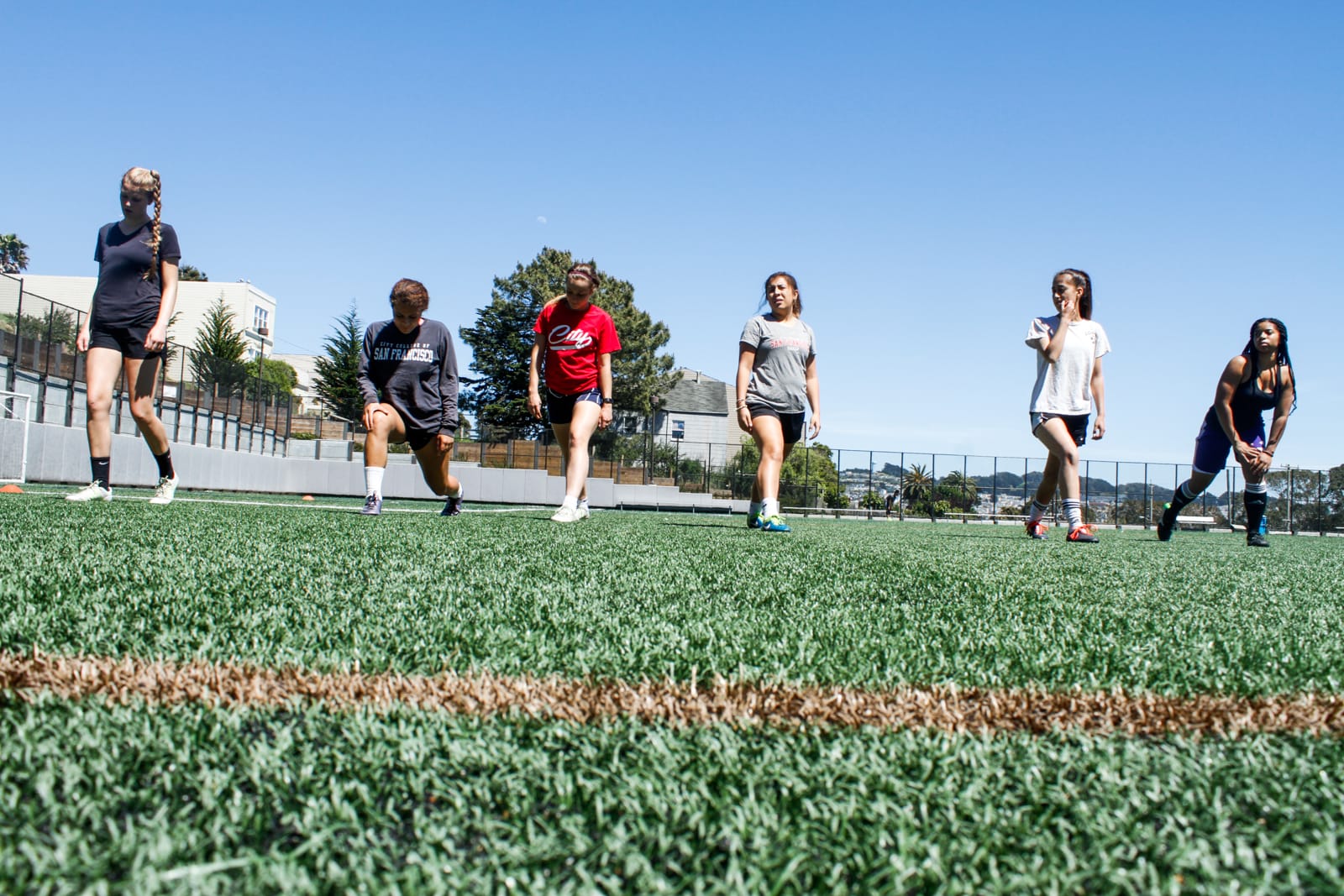 Women’s soccer team does lunges during practice at Ocean Campus on May 3, 2017.