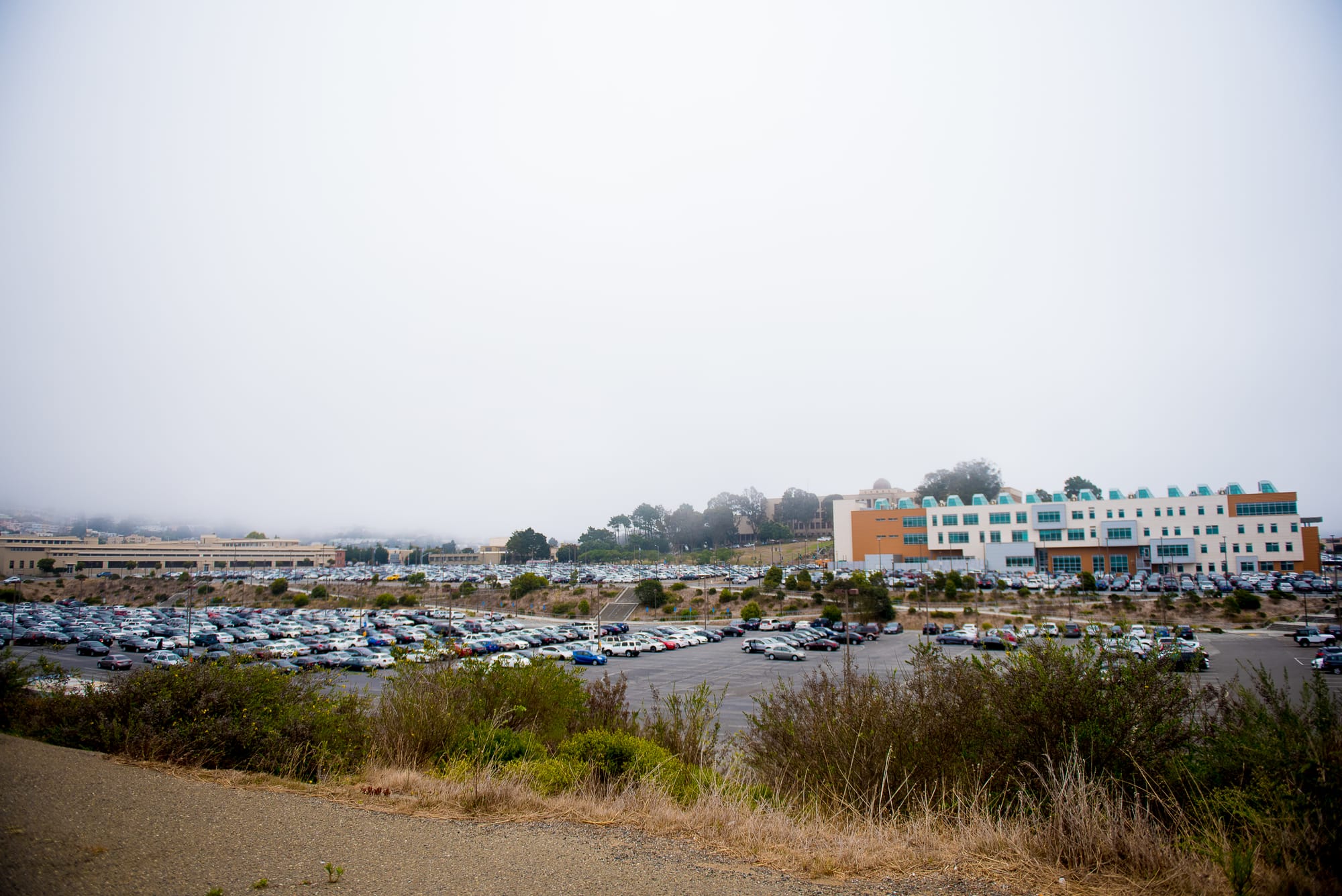  View of far end of Balboa Reservoir parking area at 9:30- out of frame portion is full. Taken Aug 28 2017 by Otto Pippenger.
