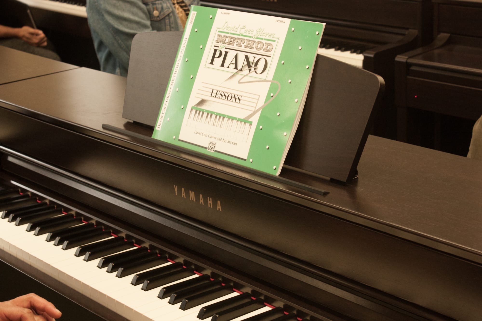Students prepare for their first day of piano class with new Yamaha pianos.  They test out the keys as they wait for the professor to arrive. August 23, 2017, in San Francisco, CA. (AP Photo/ Julia Fuller) 