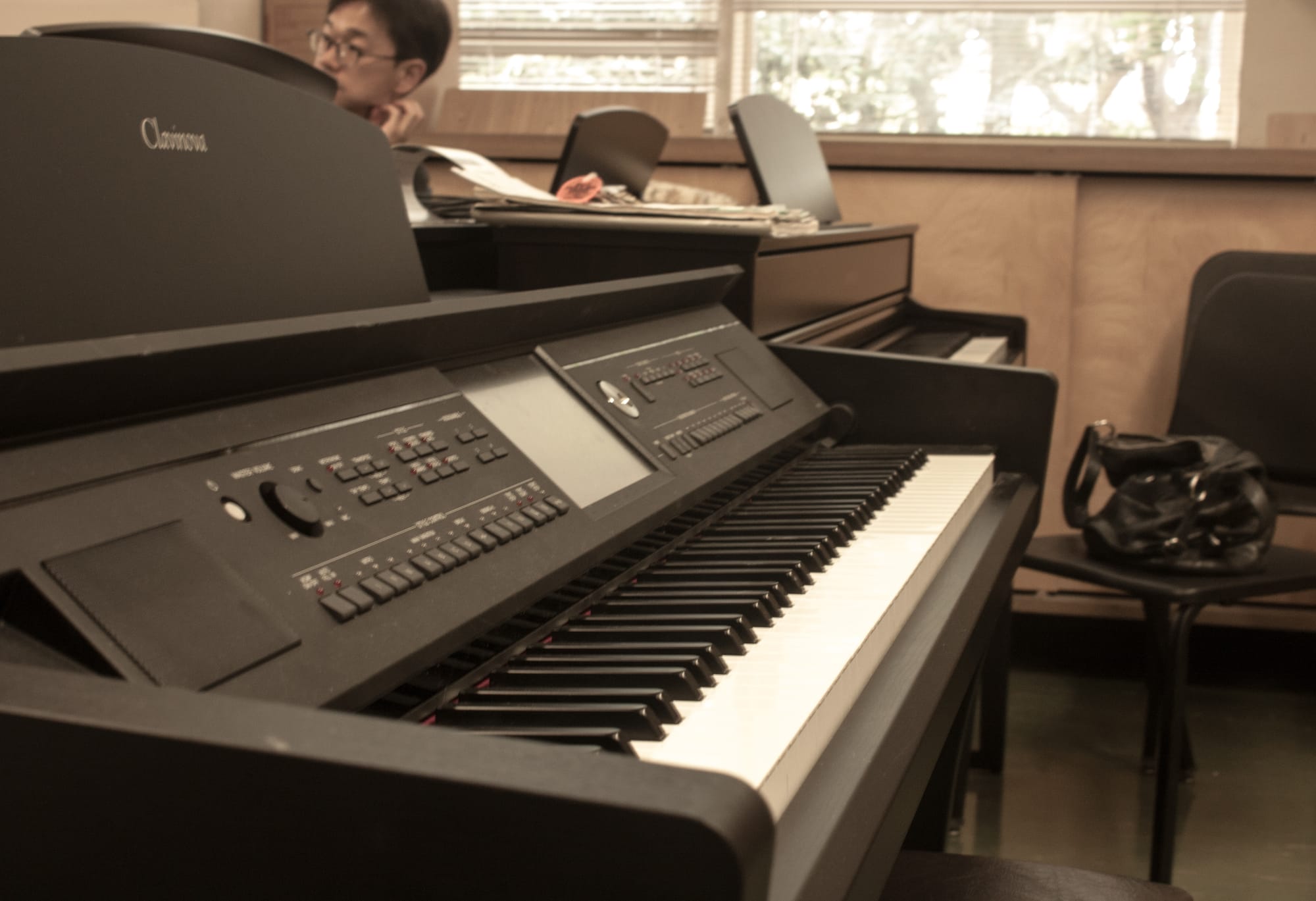 A Clavinova keyboard sits at the front of the class waiting to be played. August 23, 2017, in San Francisco, CA. (AP Photo/ Julia Fuller)