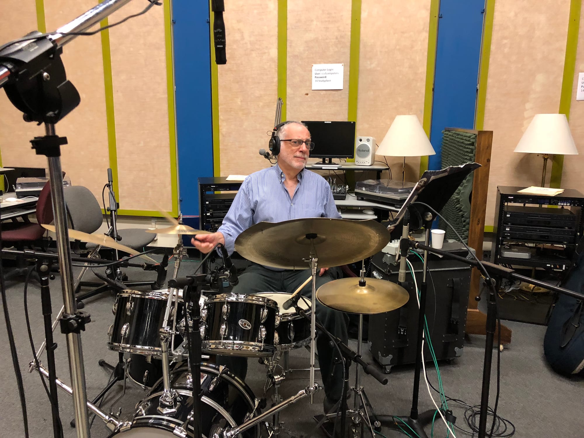 Mark Rosengarden posing with his drums. Photo by Dana Jae Labrecque.