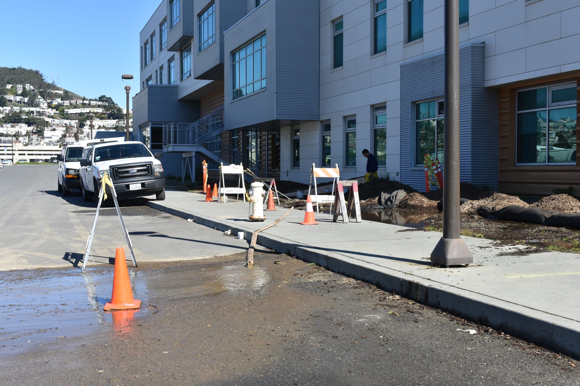ACC Engineering Systems Plumber Jose Lopez inspects the source of a water leak at the Ocean Campus Multi-Use Building (MUB). Feb. 15, 2018. Michael Menaster/The Guardsman