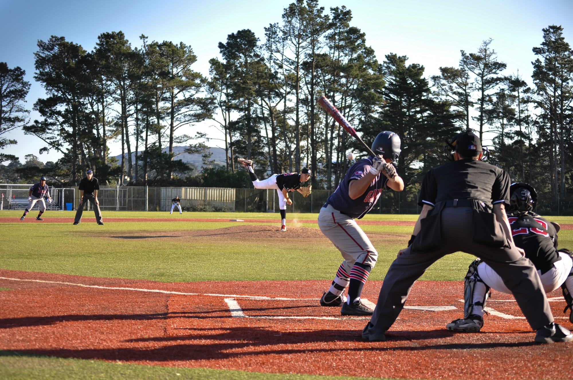 City College Men's baseball sophomore pitcher Daniel Walsh delivers the pitch in the win against the Gavilan Eagles on Feb. 3, 2018. Photo by Peter J. Suter/The Guardsman. 
