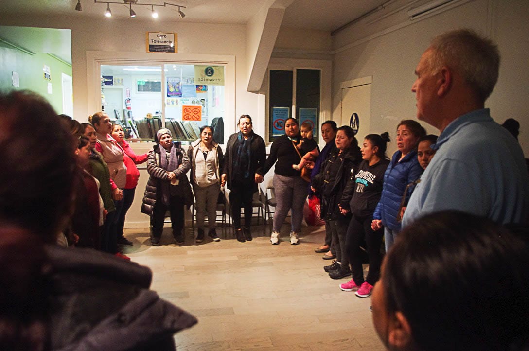 La Colectiva de Mujeres gather at the office of the Day Labor Program to plan their protest of the cancellation of the labor studies class Working Tales, on Jan. 22. Photo by Victor Tence. 