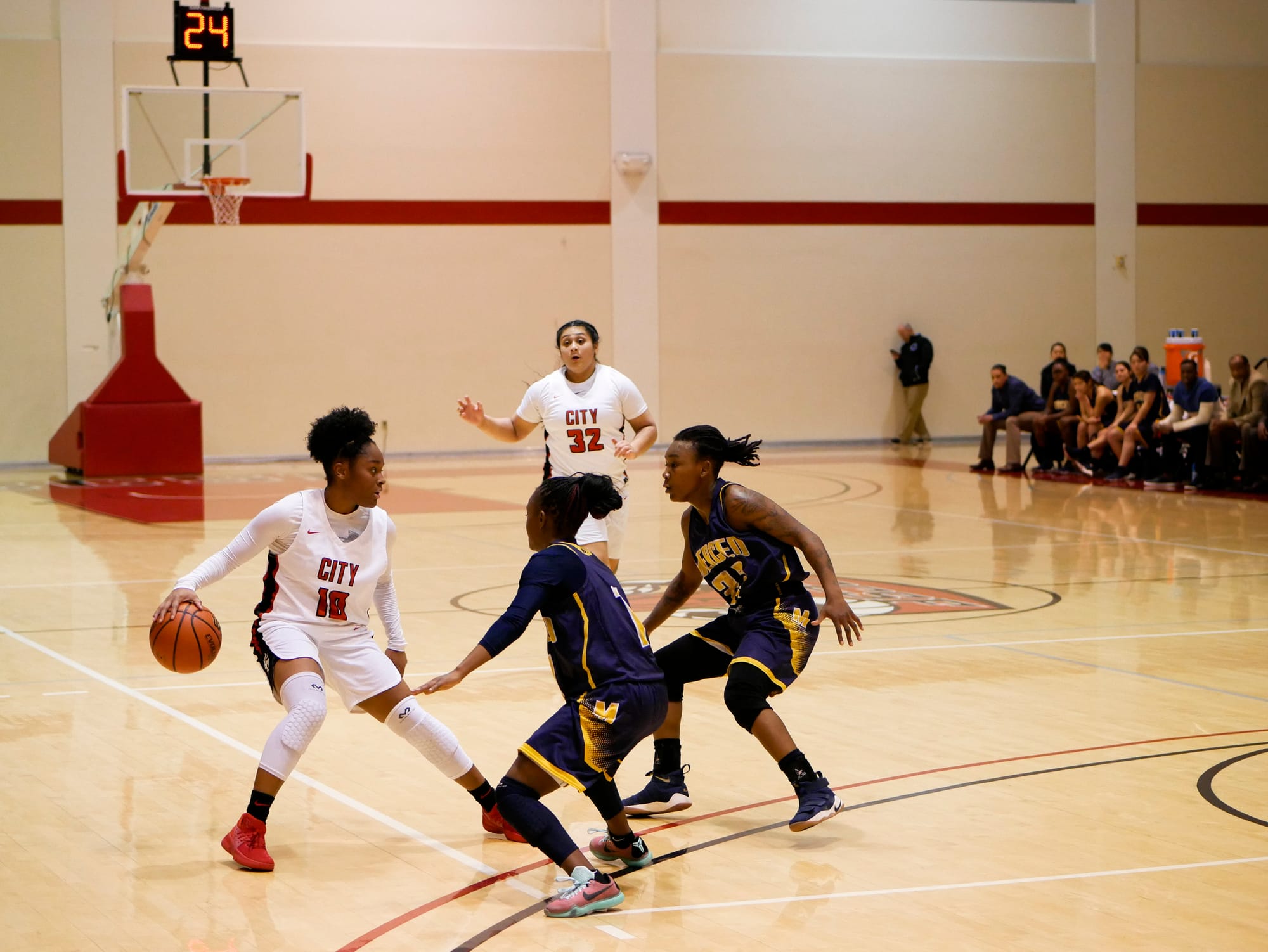 The Rams sophomore guard Caprice Taylor (#10) dribbles up court against Merced College on March 3, 2018. Photo by James Comfort/Special to The Guardsman. 